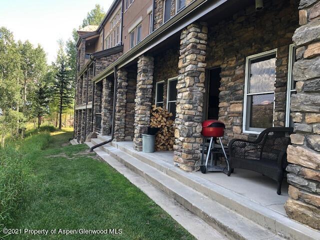 425 Wood Run Road, Unit 36 Snowmass Village, CO 81615 - Photo 20 of 23 a view of street with sitting area