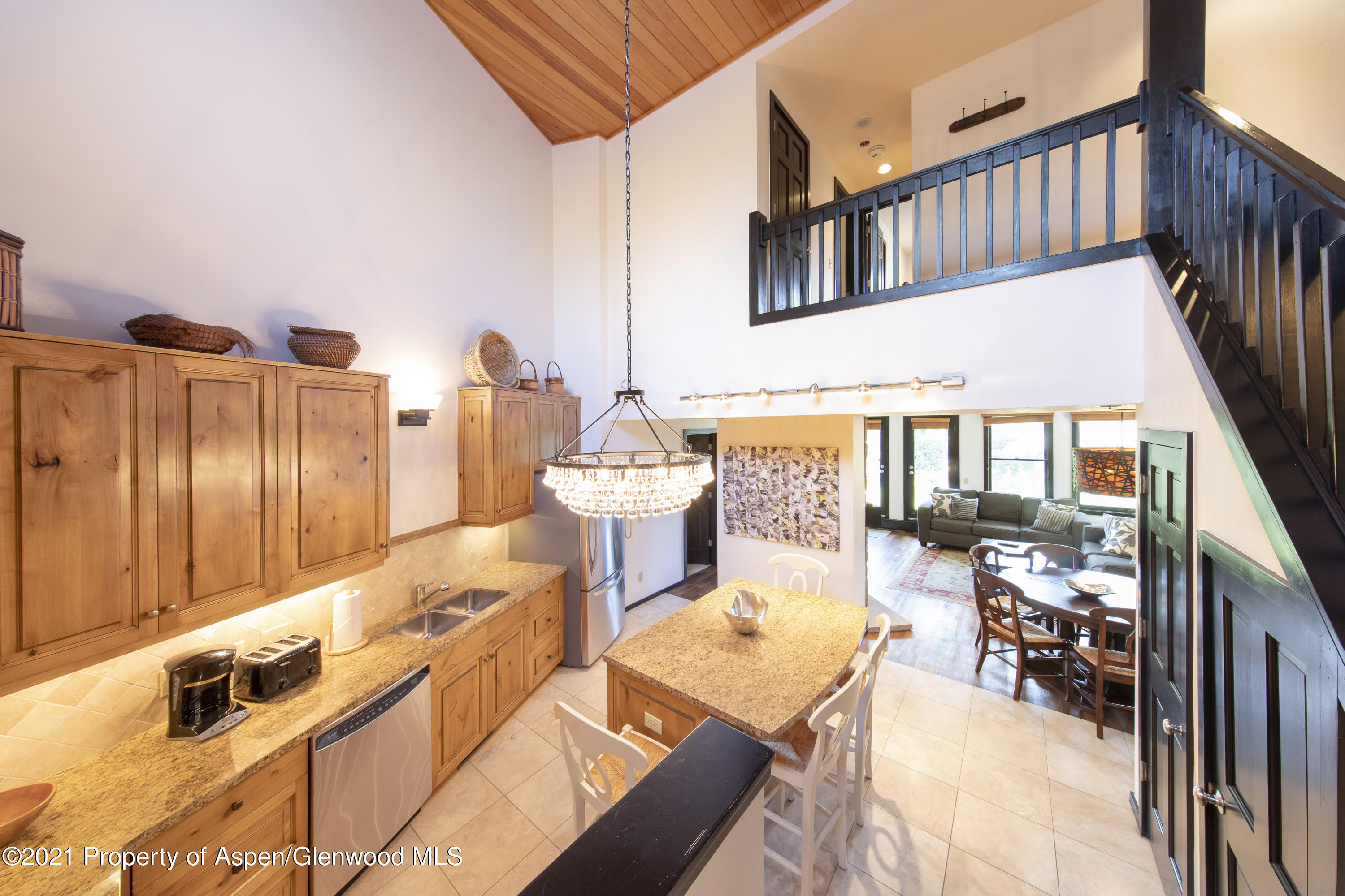 425 Wood Run Road, Unit 36 Snowmass Village, CO 81615 - Photo 2 of 23 a very nice looking room with many windows