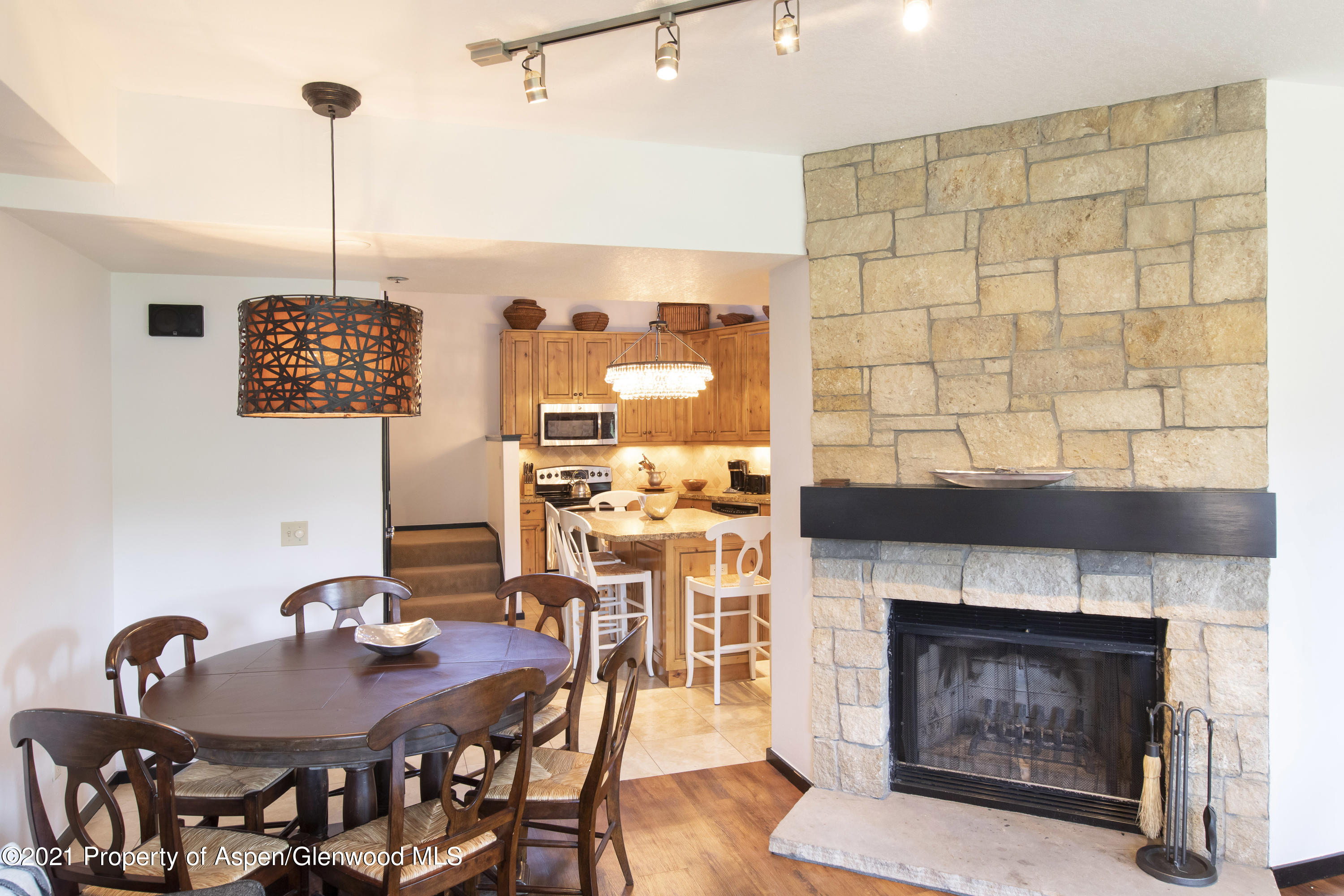425 Wood Run Road, Unit 36 Snowmass Village, CO 81615 - Photo 9 of 23 a view of a livingroom with furniture and fireplace