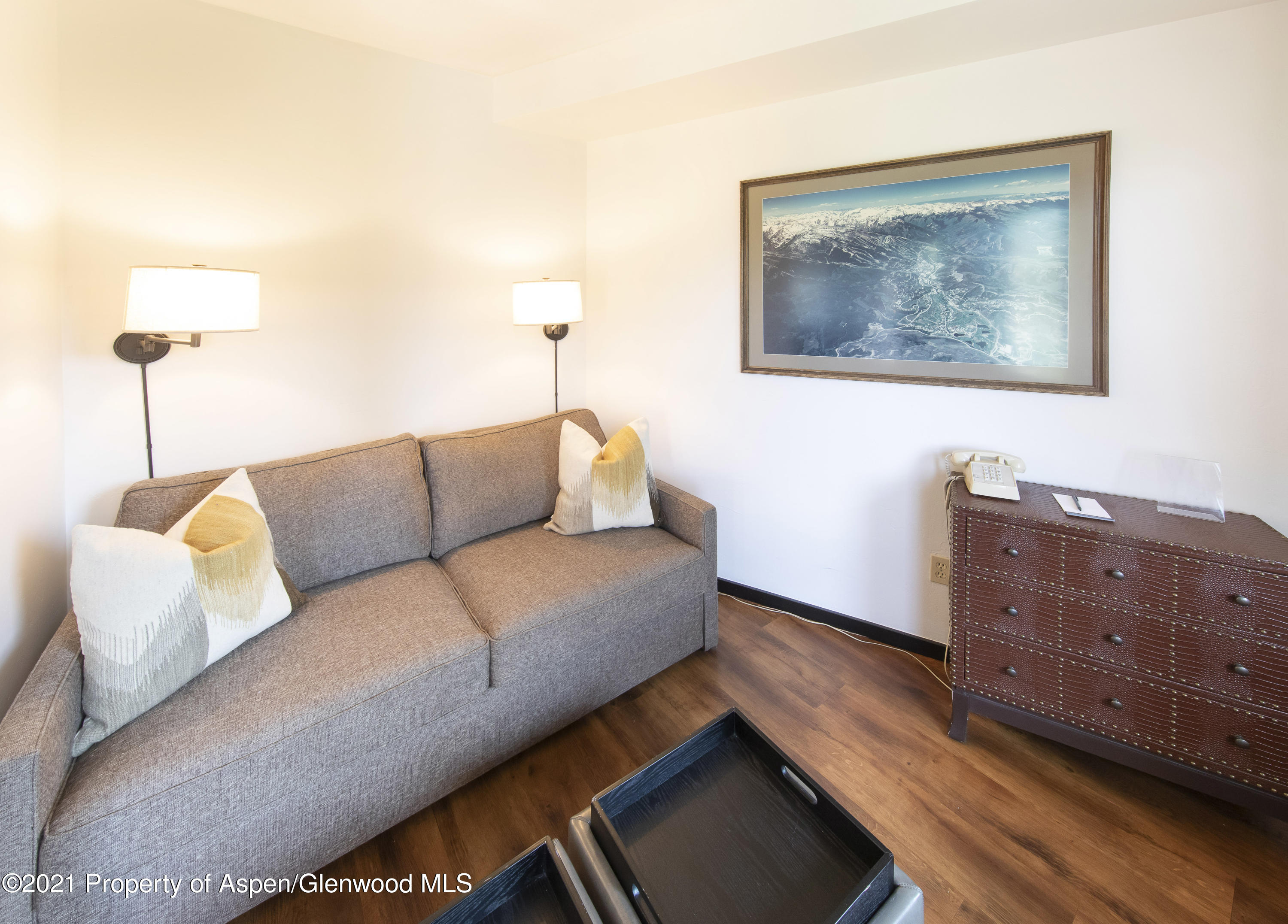 425 Wood Run Road, Unit 36 Snowmass Village, CO 81615 - Photo 10 of 23 a living room with furniture and a lamp