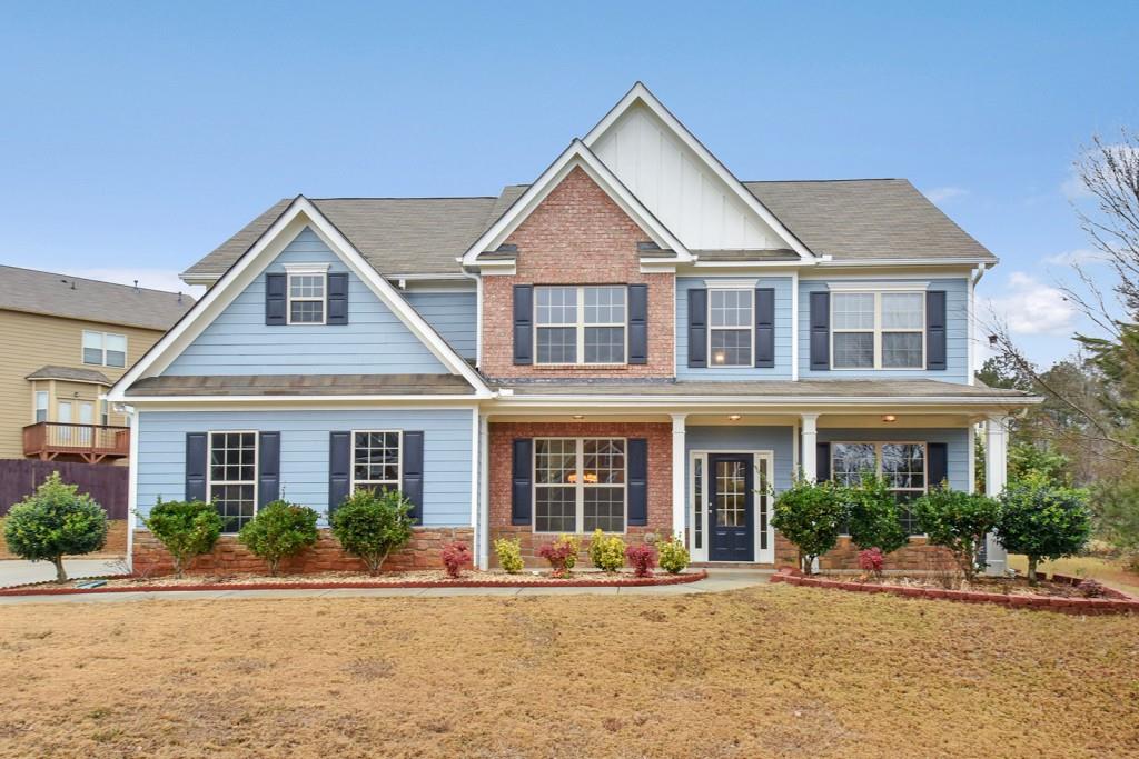 133 Oakland Way Dallas, GA 30157 - Photo 1 of 1 front view of a house with a yard