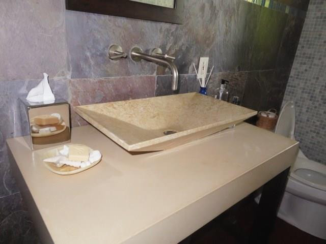 540 Bay Point Road Miami, FL 33137 - Photo 12 of 42 a bathroom with a sink and a mirror