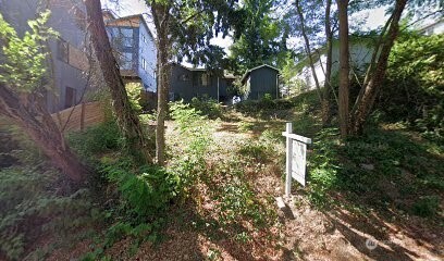 a backyard of a house with lots of green space