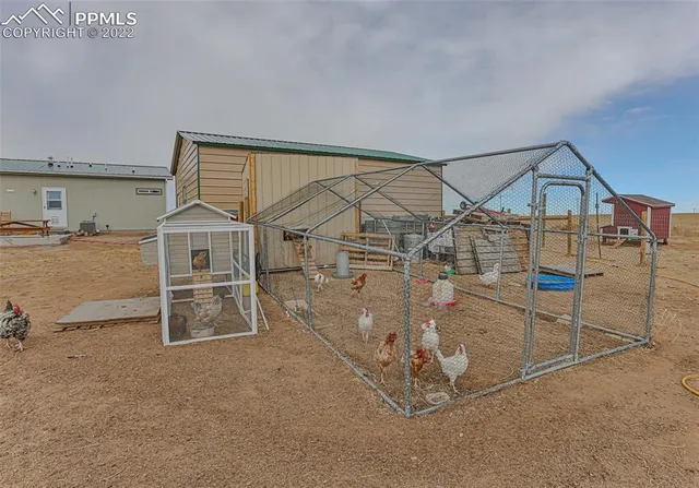 a room with lots of wooden cabinets