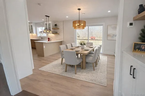 a view of a dining room with furniture