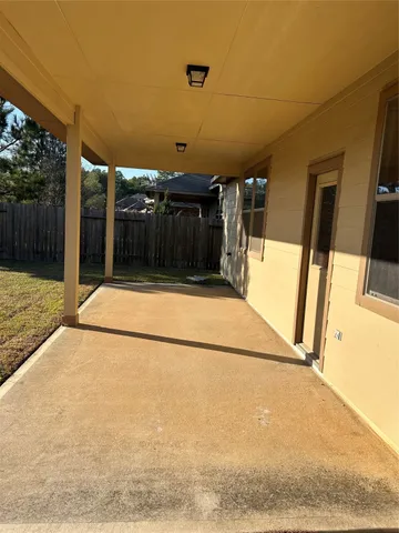 a view of a back yard of the house