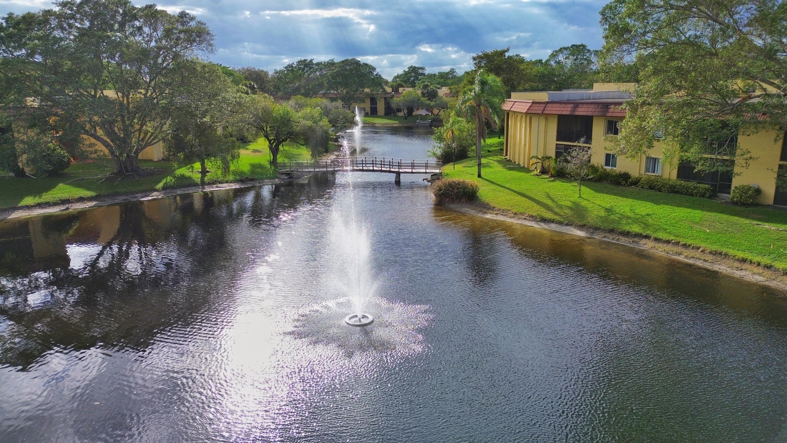 854 Southwest 9th St Circle, Unit 203 Boca Raton, FL 33486 - Photo 20 of 22 Lake and bridge