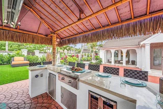 a patio with a patio table and chairs