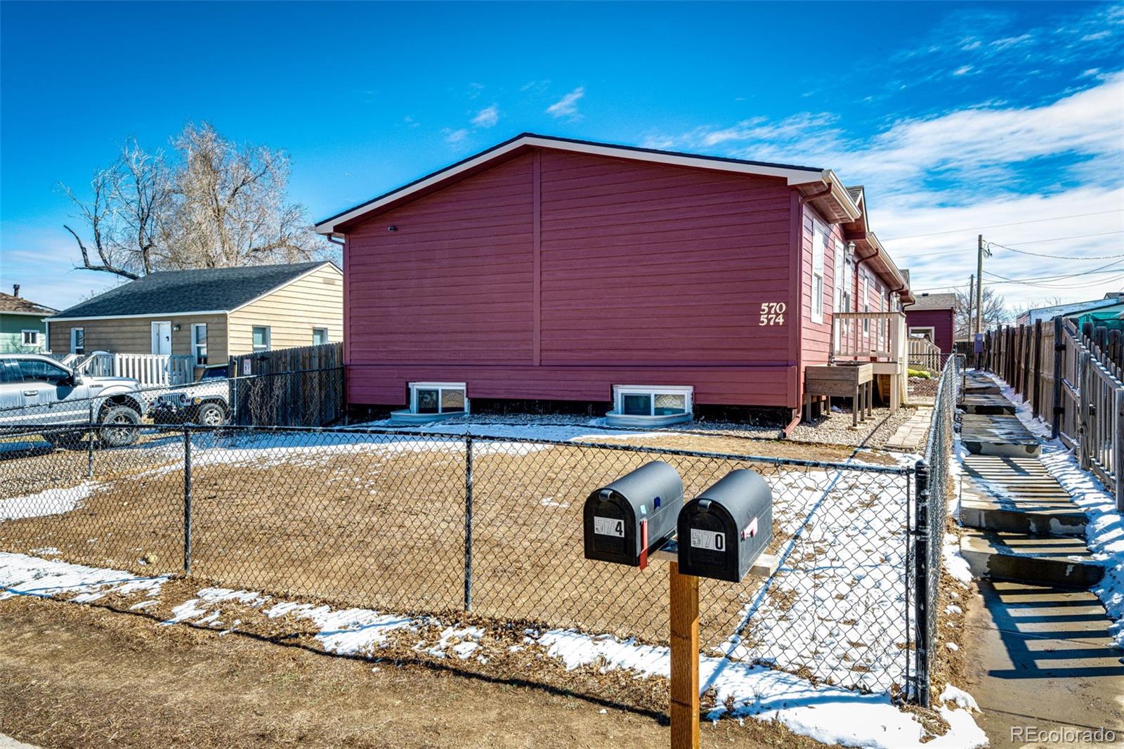 570 4th Street Bennett, CO 80102 - Photo 5 of 36 a view of a house with a yard
