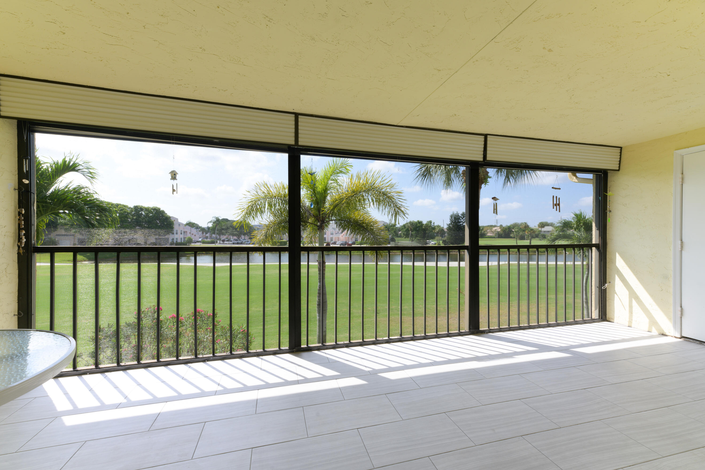 2042 Keystone Drive, Unit B Jupiter, FL 33458 - Photo 11 of 18 Covered/Screened Patio- Golf View