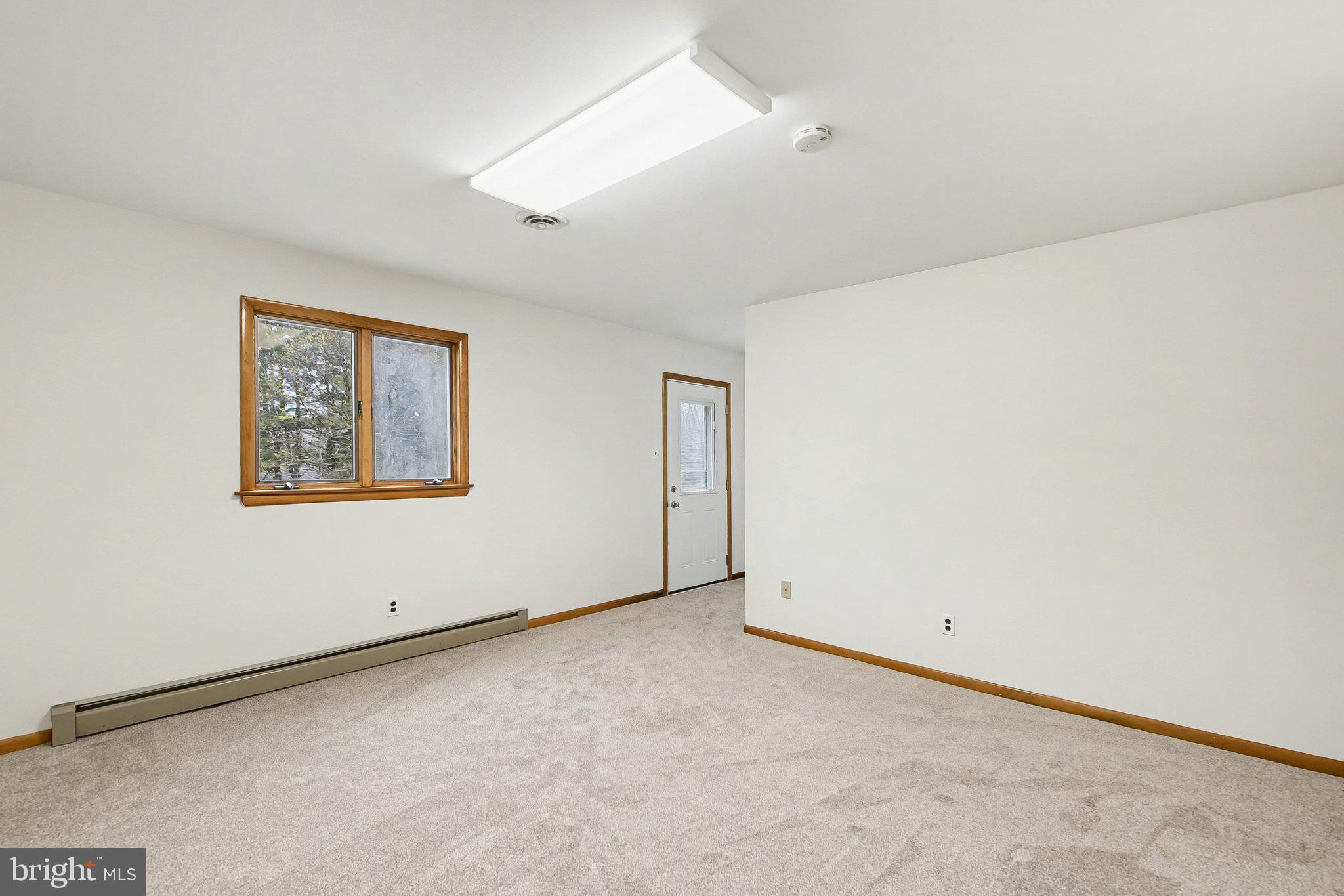 1621 Liberty Grove Road Conowingo, MD 21918 - Photo 25 of 36 Downstairs Laundry Room with Walk-Out Access