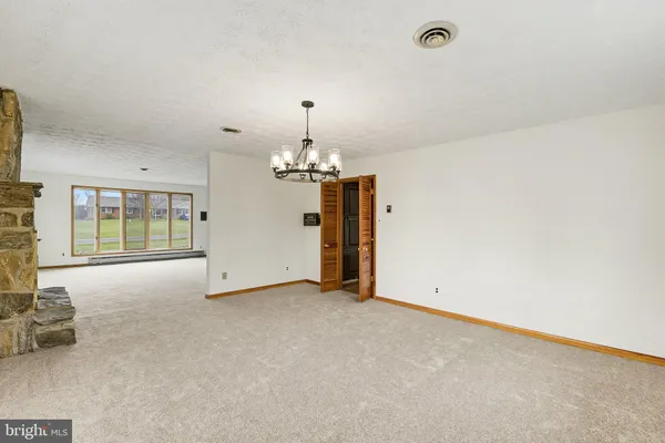a view of a livingroom with a chandelier
