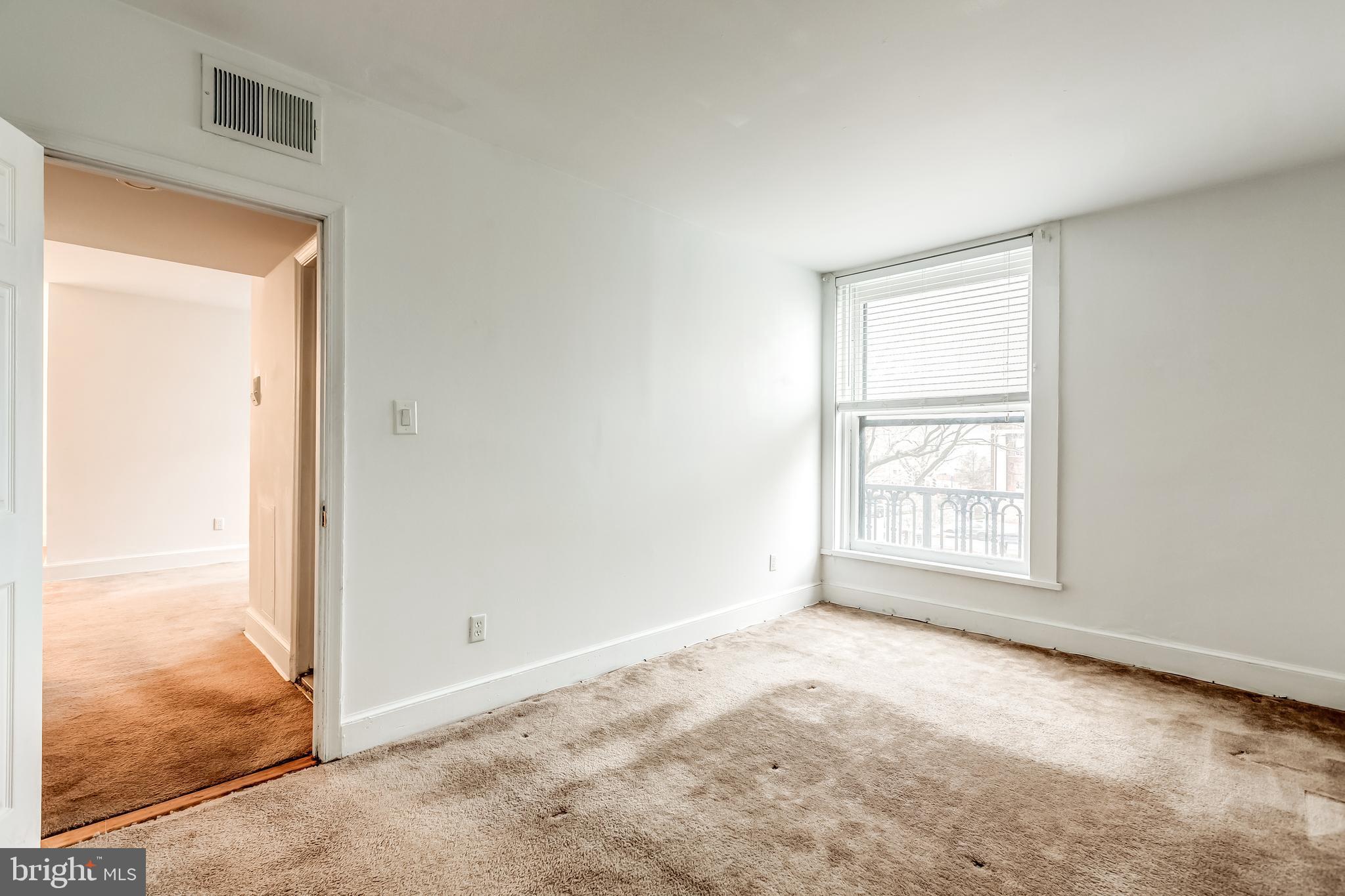 3060 16th Street Northwest, Unit 308 Washington, DC 20009 - Photo 13 of 21 an empty room with windows