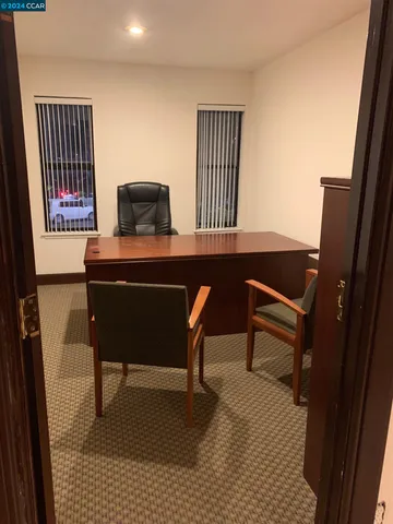 a room with furniture and a window