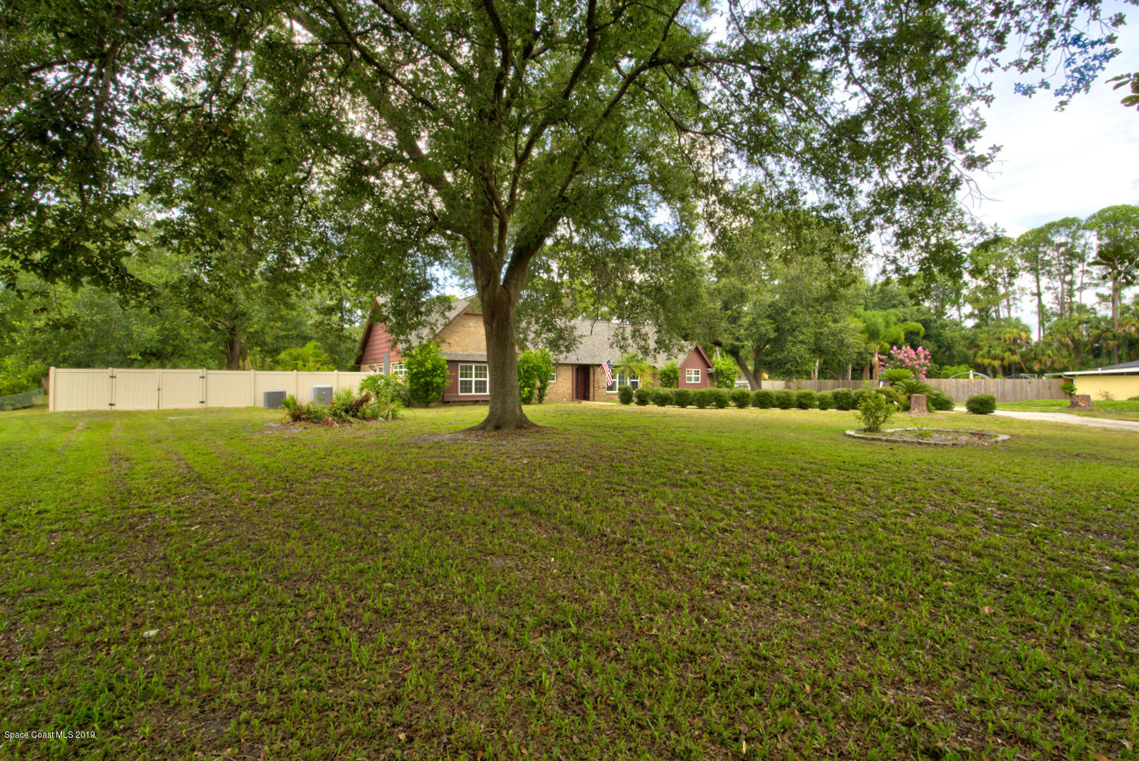 2665 Wagon Road Cocoa, FL 32926 - Photo 3 of 61 Front yard left