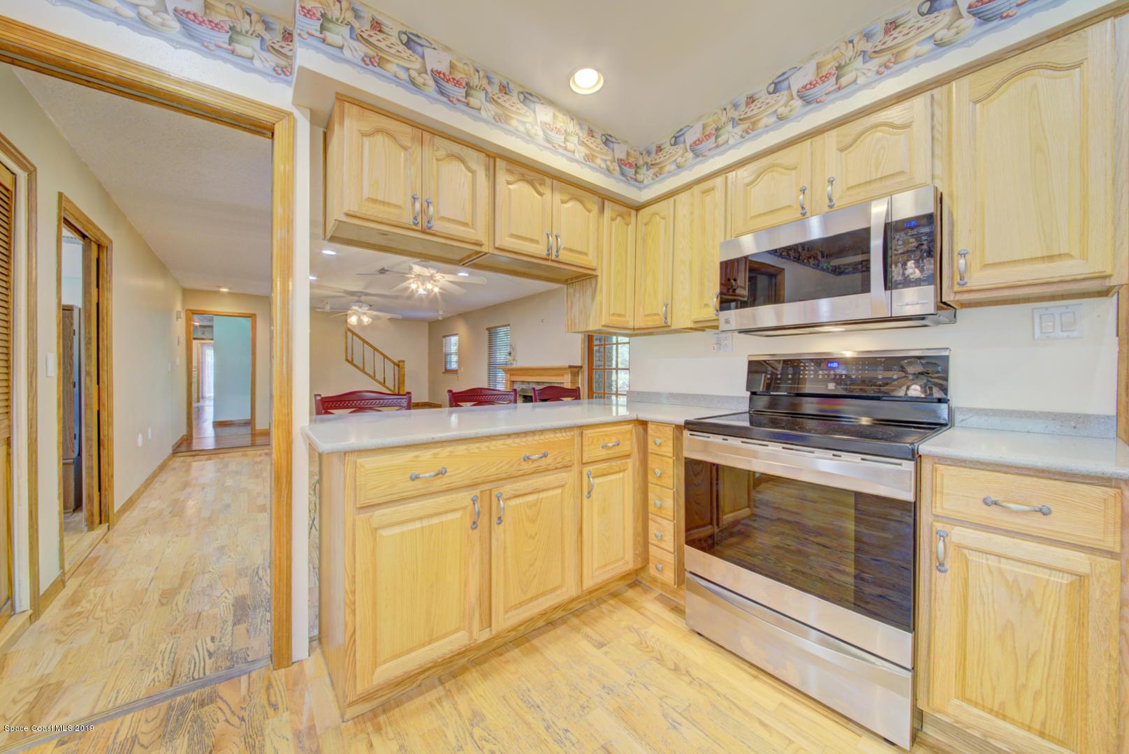 2665 Wagon Road Cocoa, FL 32926 - Photo 21 of 61 kitchen with breakfast bar
