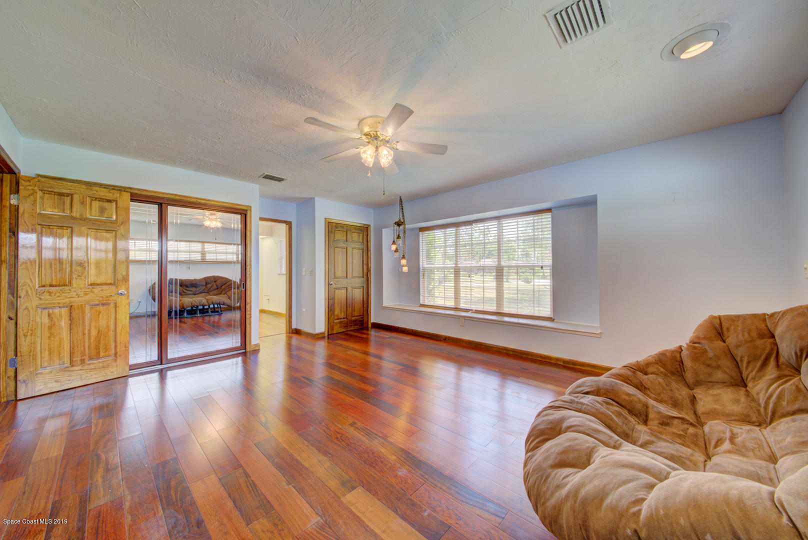 2665 Wagon Road Cocoa, FL 32926 - Photo 28 of 61 master bedroom with window seat