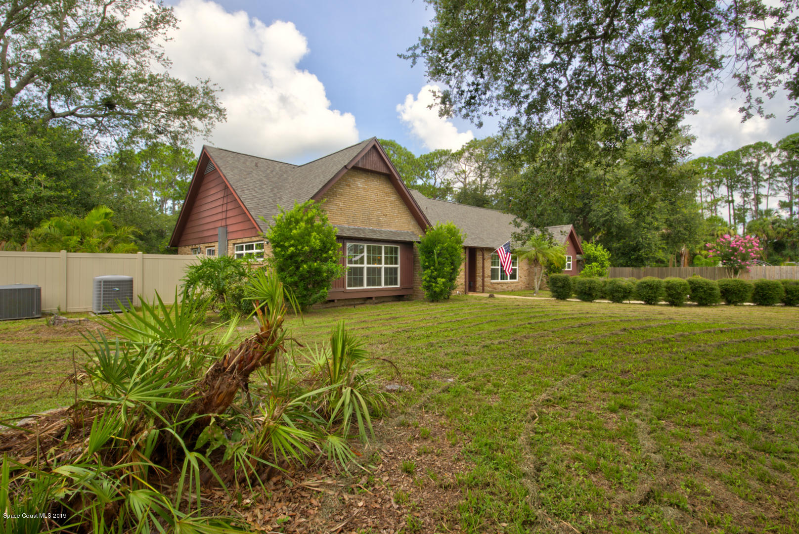 2665 Wagon Road Cocoa, FL 32926 - Photo 4 of 61 Front of house left