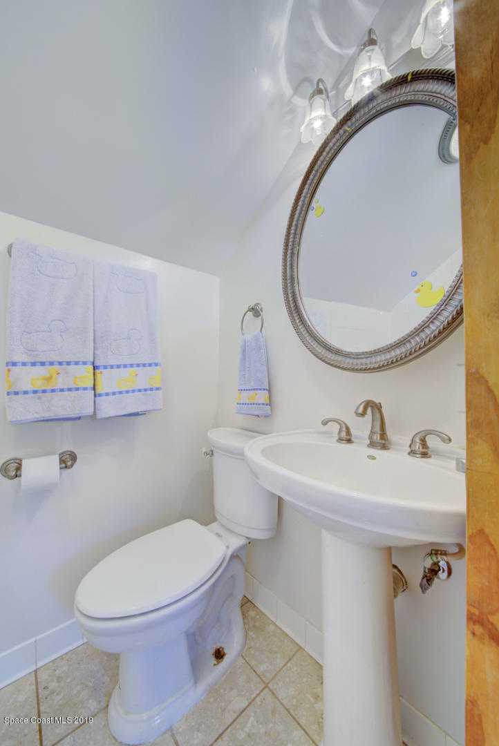 2665 Wagon Road Cocoa, FL 32926 - Photo 39 of 61 bathroom 3 pedestal sink