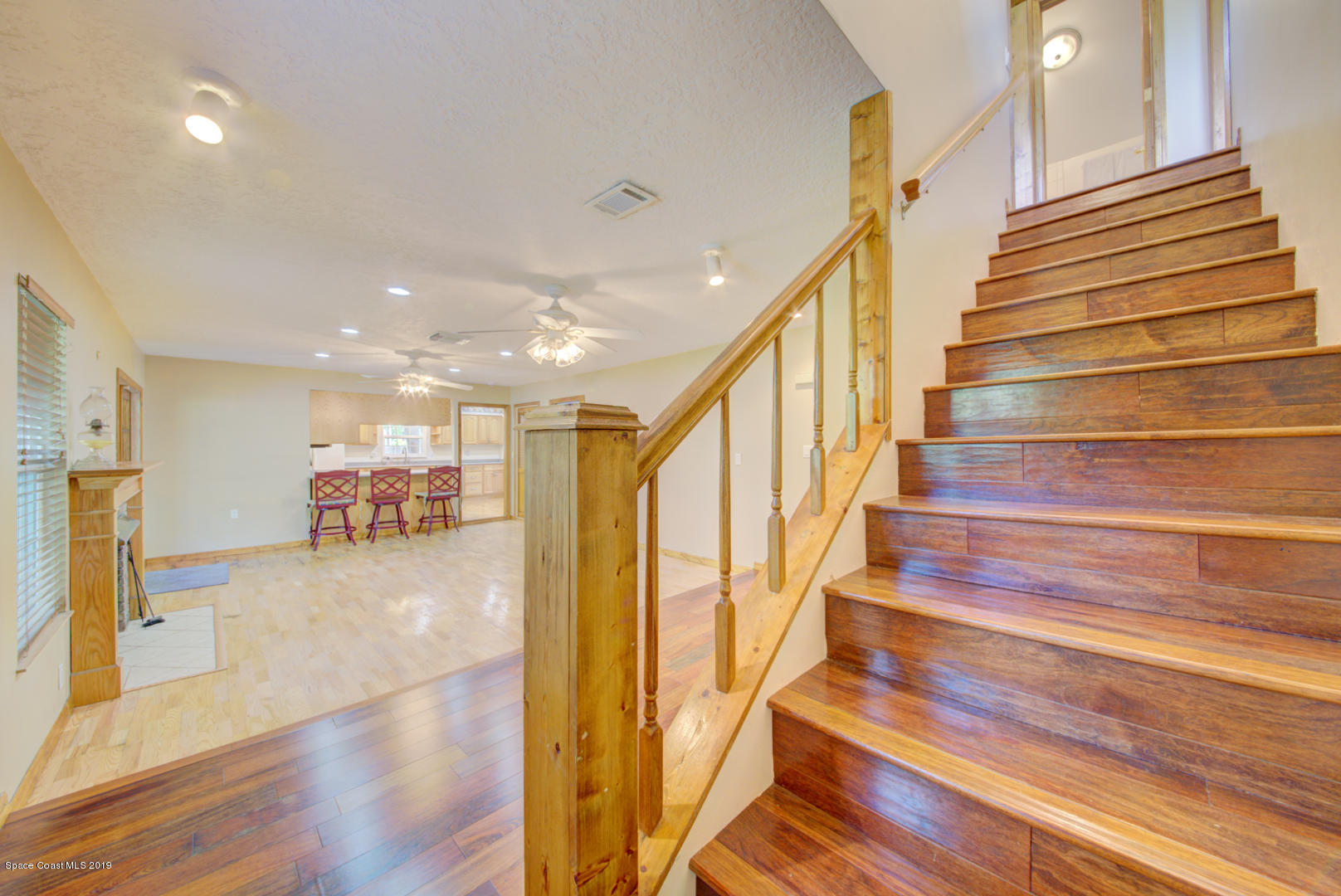 2665 Wagon Road Cocoa, FL 32926 - Photo 41 of 61 stairwell to second floor