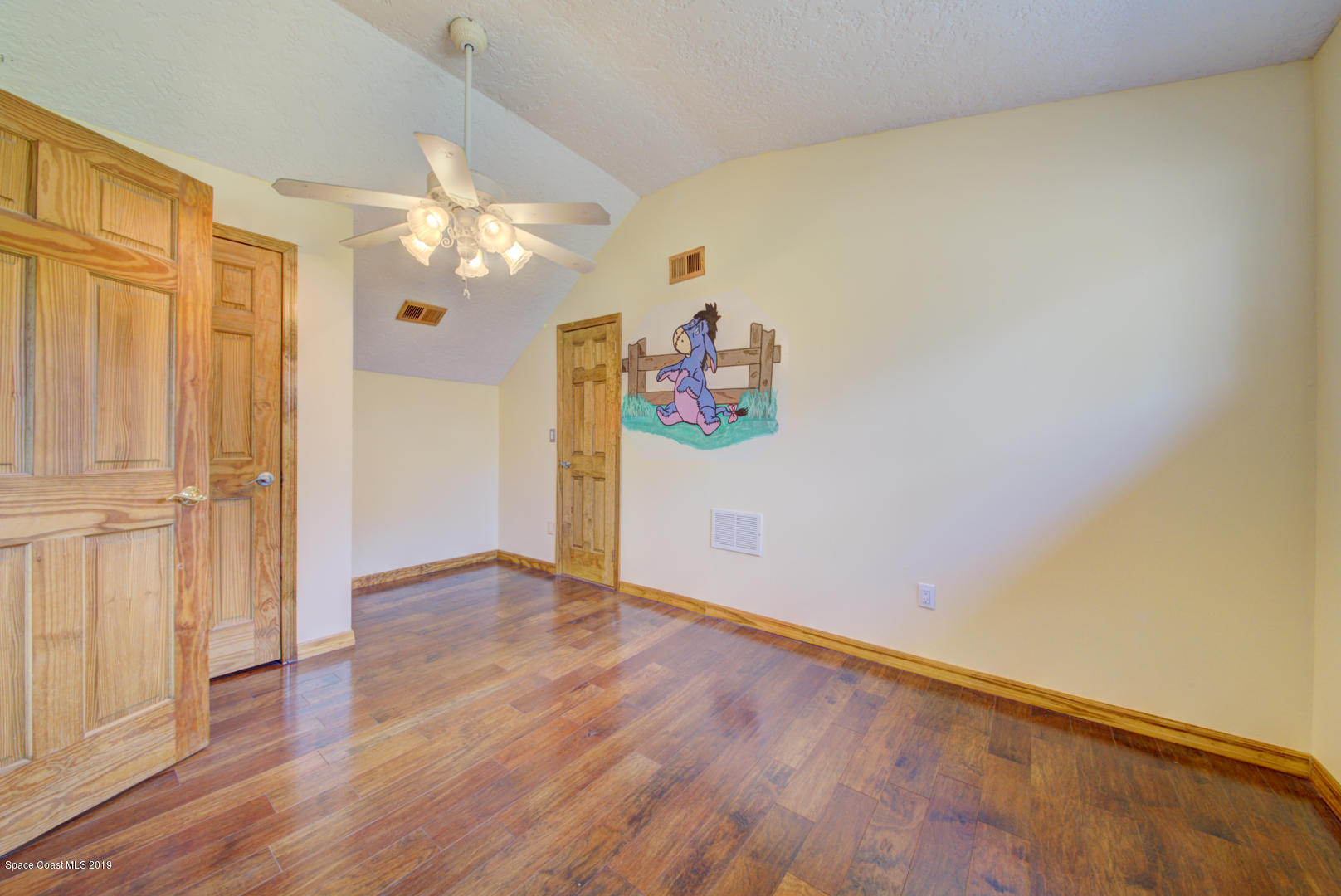 2665 Wagon Road Cocoa, FL 32926 - Photo 43 of 61 bedroom 4 with wood floors