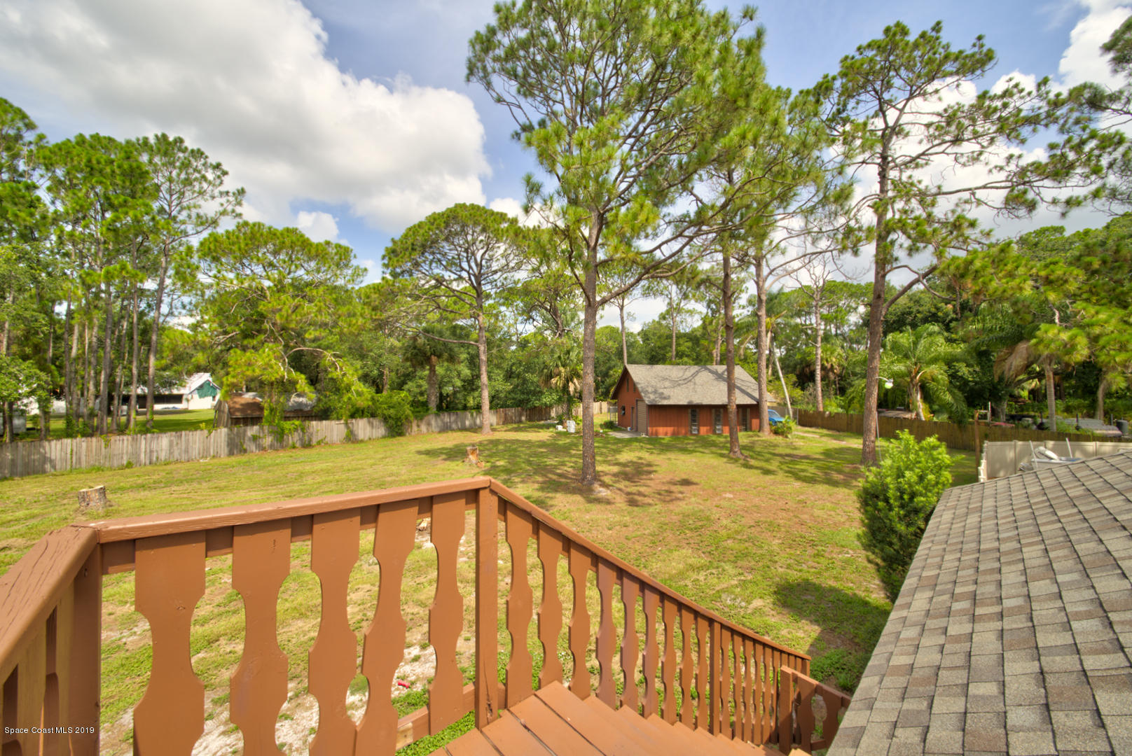 2665 Wagon Road Cocoa, FL 32926 - Photo 50 of 61 roof deck & stairs to yard