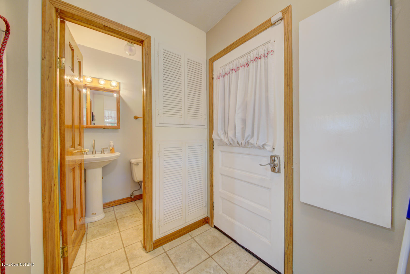 2665 Wagon Road Cocoa, FL 32926 - Photo 59 of 61 mudroom off garage