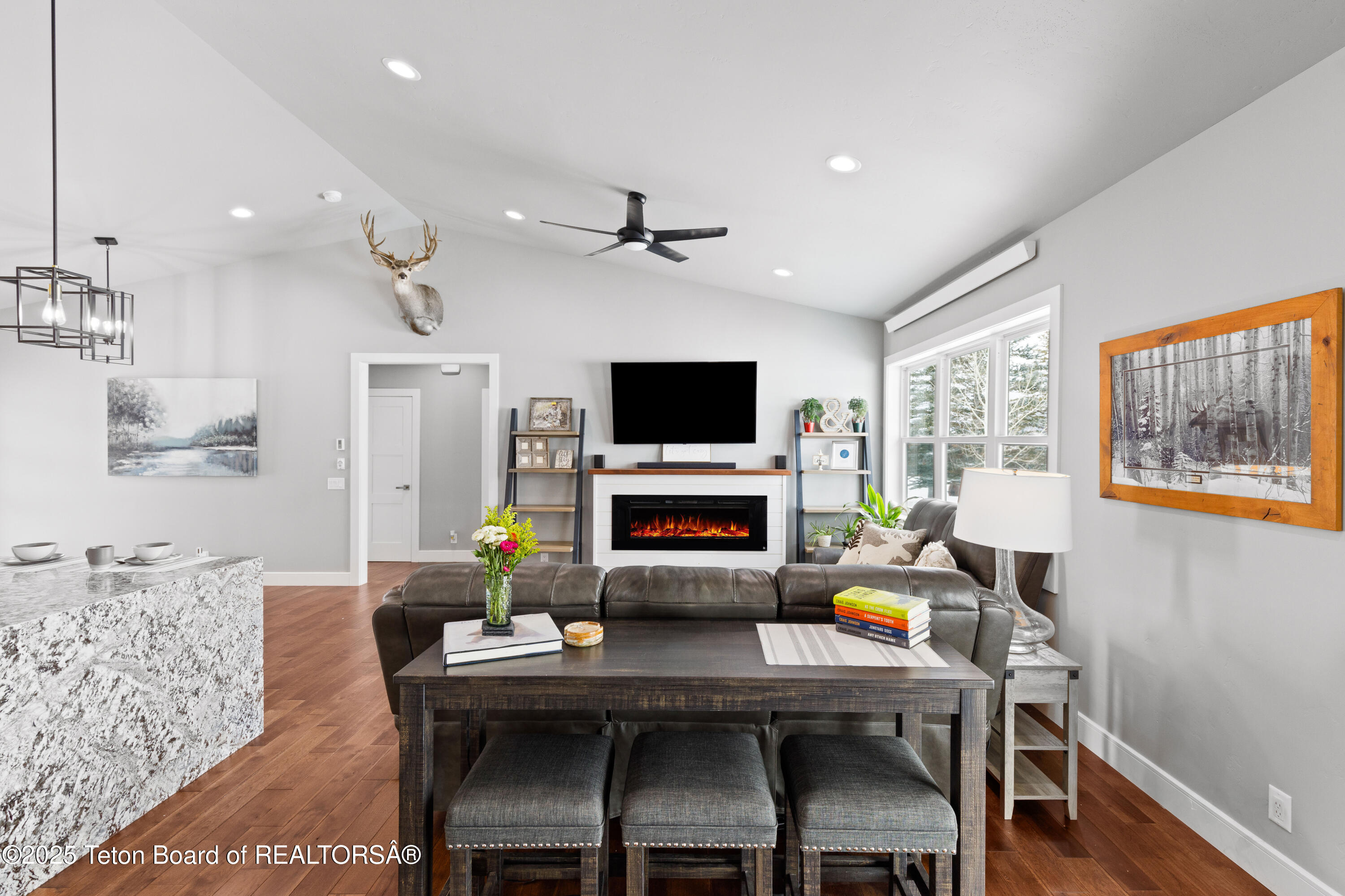 152 Porto Road Star Valley Ranch, WY 83127 - Photo 17 of 44 Fireplace and Tons of Light