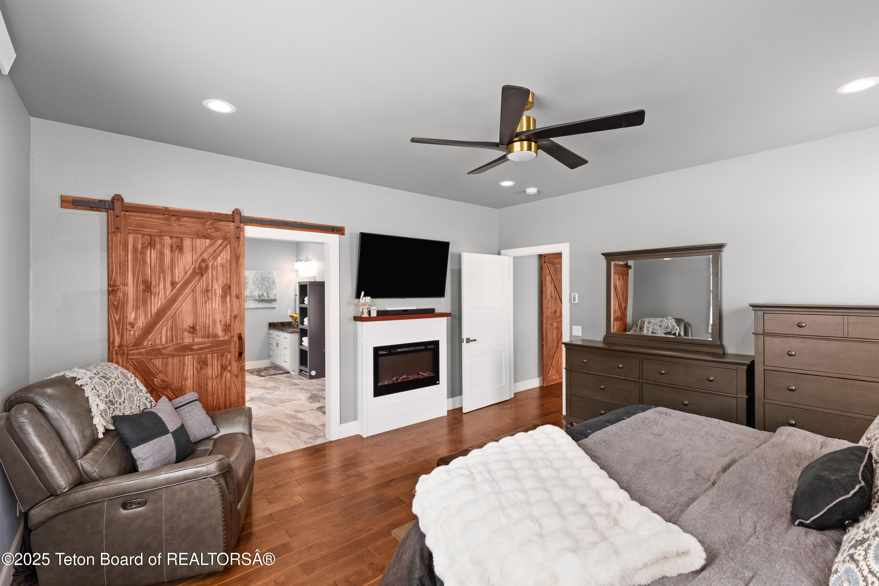 152 Porto Road Star Valley Ranch, WY 83127 - Photo 19 of 44 Master Suite with Fireplace
