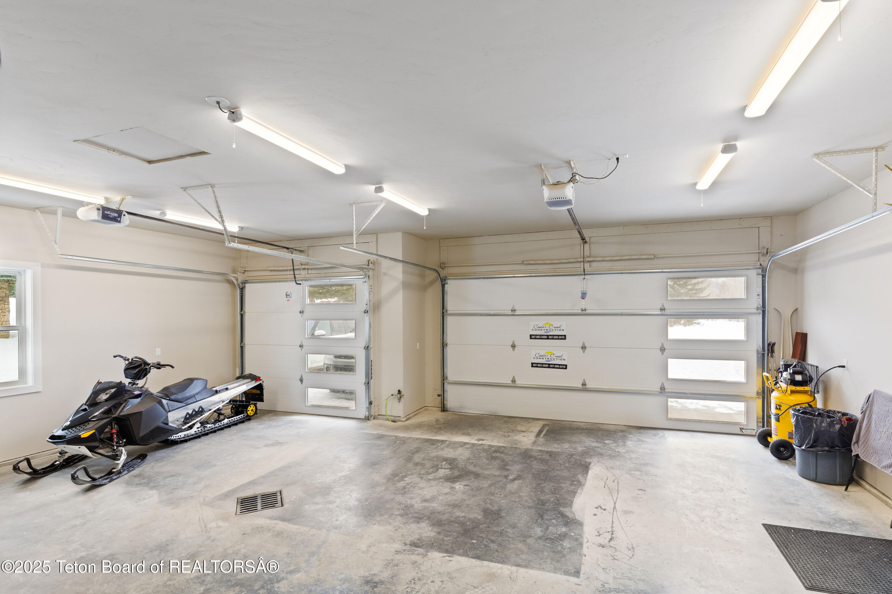 152 Porto Road Star Valley Ranch, WY 83127 - Photo 27 of 44 Huge 2 car garage for all the toys!