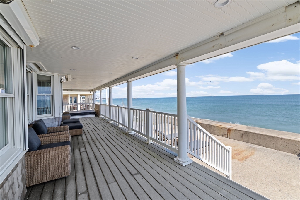 57 Surfside Road Scituate, MA 02066 - Photo 14 of 39 a view of a balcony with couch