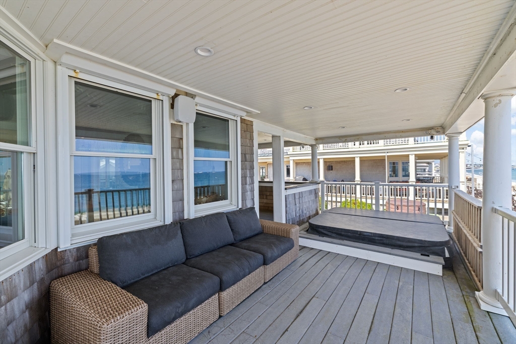 57 Surfside Road Scituate, MA 02066 - Photo 15 of 39 a living room with furniture and a large window