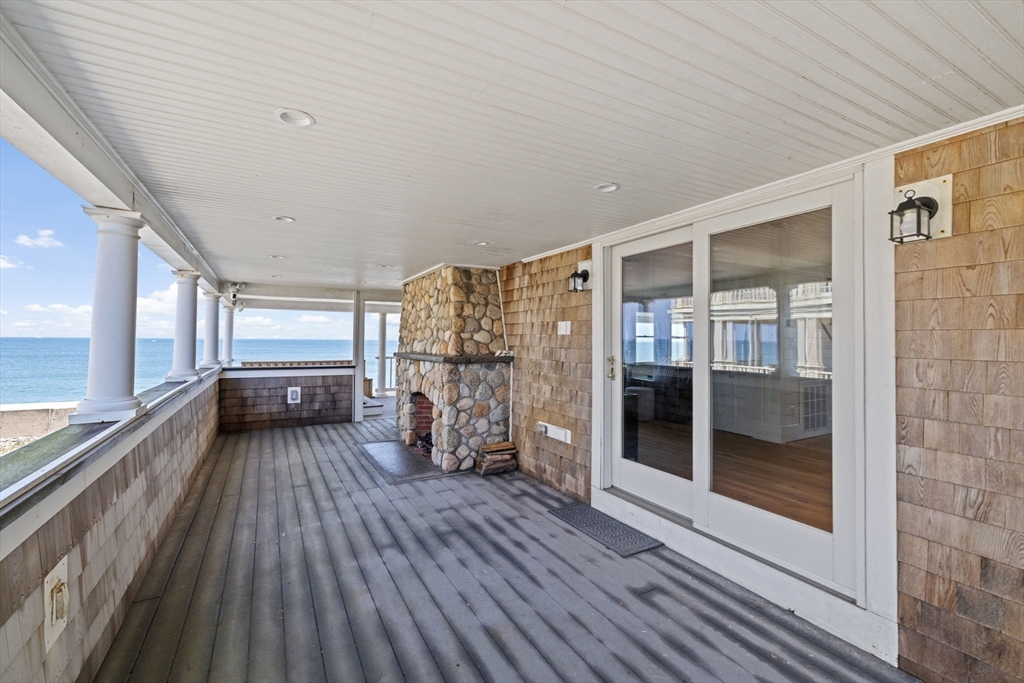 57 Surfside Road Scituate, MA 02066 - Photo 16 of 39 a view of a balcony with wooden floor