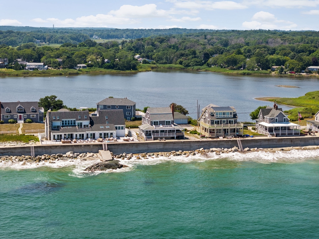 57 Surfside Road Scituate, MA 02066 - Photo 2 of 39 a view of a lake with a city view