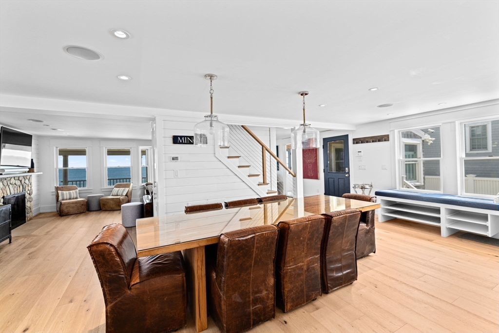 57 Surfside Road Scituate, MA 02066 - Photo 21 of 39 a living room with furniture a wooden floor and a window