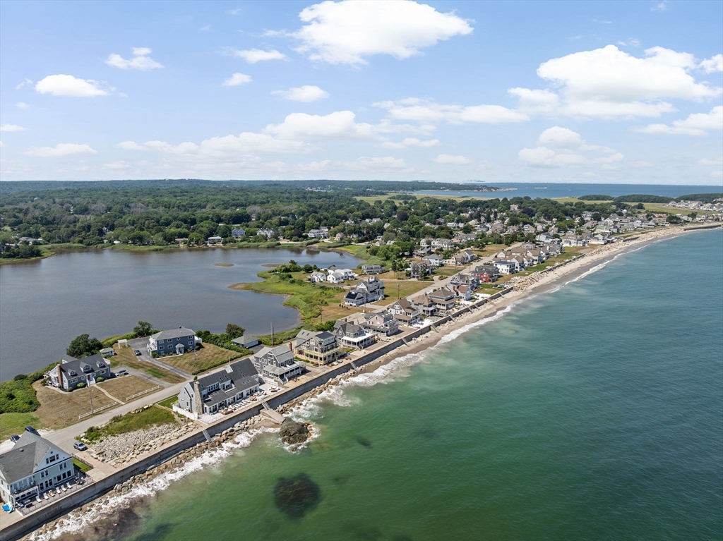 57 Surfside Road Scituate, MA 02066 - Photo 3 of 39 a view of a lake with a city