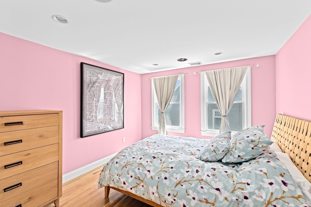 57 Surfside Road Scituate, MA 02066 - Photo 31 of 39 a bedroom with a bed and a window