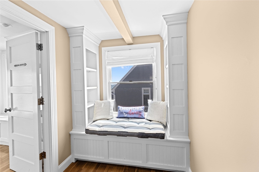 57 Surfside Road Scituate, MA 02066 - Photo 34 of 39 a bedroom with a bed and a mirror