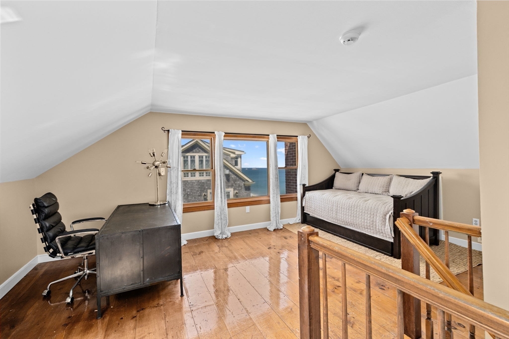 57 Surfside Road Scituate, MA 02066 - Photo 35 of 39 a living room with furniture and a floor to ceiling window