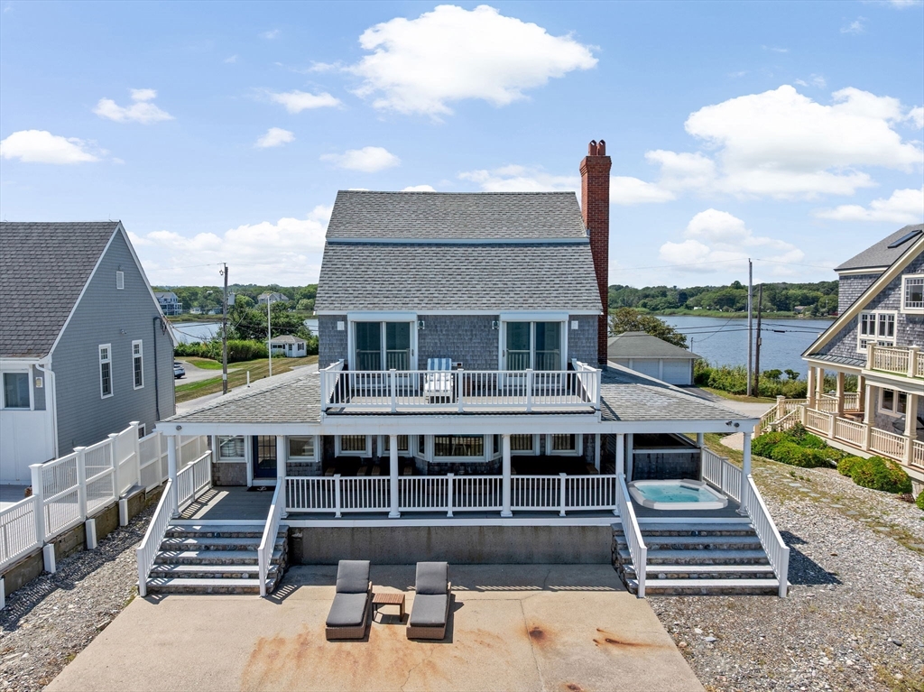 57 Surfside Road Scituate, MA 02066 - Photo 39 of 39 a view of a house with wooden deck