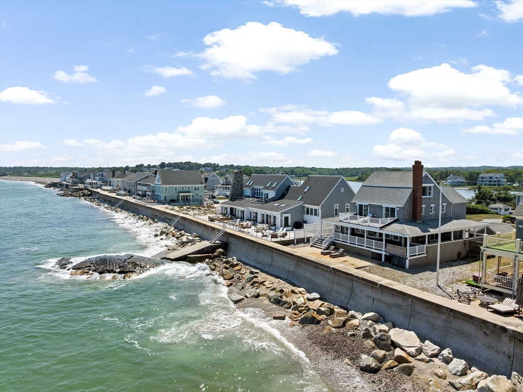 57 Surfside Road Scituate, MA 02066 - Photo 6 of 39 a view of a lake with a city