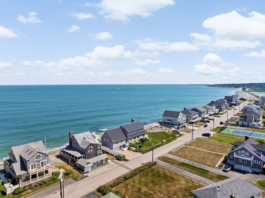 57 Surfside Road Scituate, MA 02066 - Photo 7 of 39 a view of a ocean with furniture