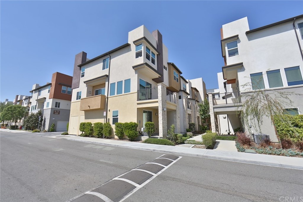 714 Brooklyn Drive Brea, CA 92821 - Photo 13 of 31 a front view of a building with a street