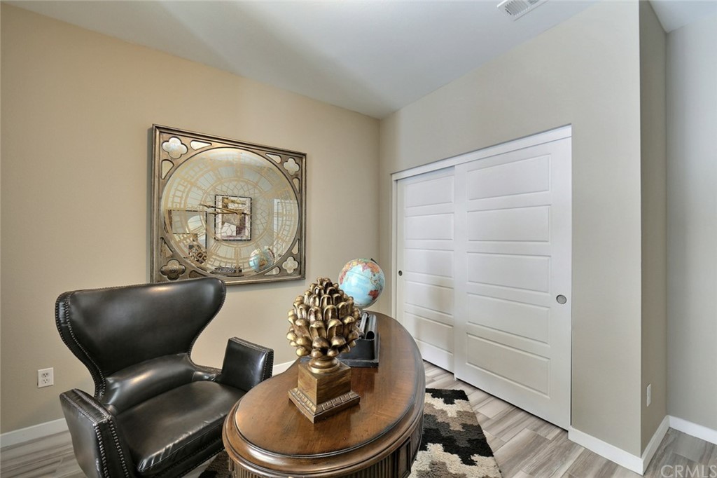 714 Brooklyn Drive Brea, CA 92821 - Photo 25 of 31 a living room with furniture and a painting