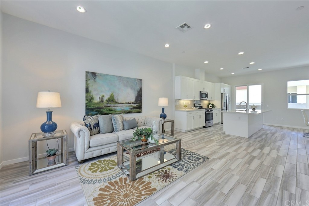 714 Brooklyn Drive Brea, CA 92821 - Photo 4 of 31 a living room with furniture and a view of kitchen