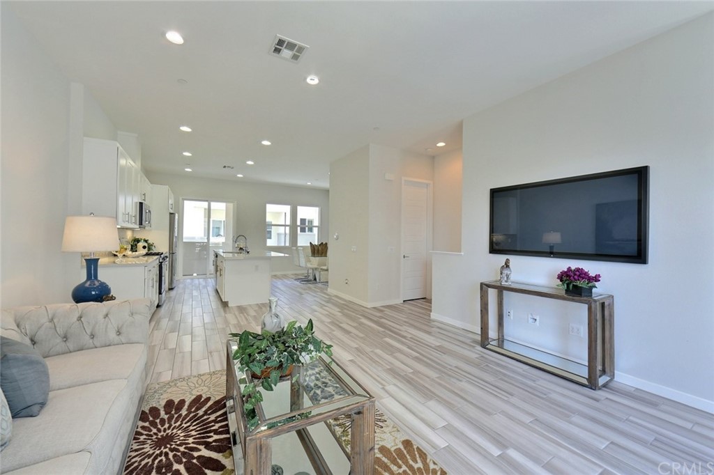 714 Brooklyn Drive Brea, CA 92821 - Photo 5 of 31 a living room with furniture and a flat screen tv