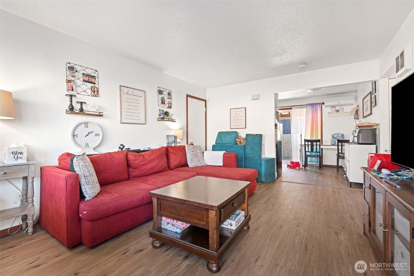 1149 Southwest Cascade Avenue Chehalis, WA 98532 - Photo 12 of 31 a living room with furniture and a flat screen tv