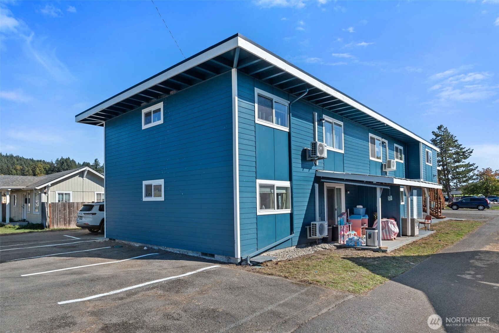 1149 Southwest Cascade Avenue Chehalis, WA 98532 - Photo 27 of 31 a view of a house with a patio and a yard