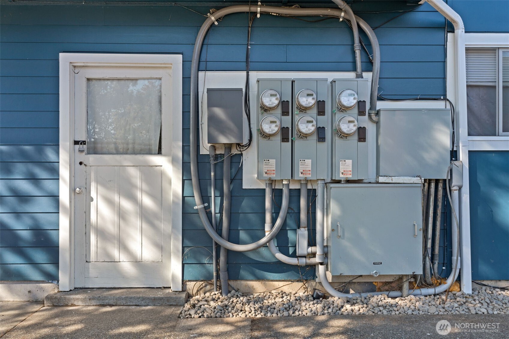 1149 Southwest Cascade Avenue Chehalis, WA 98532 - Photo 3 of 31 a room with water heater and a wooden door