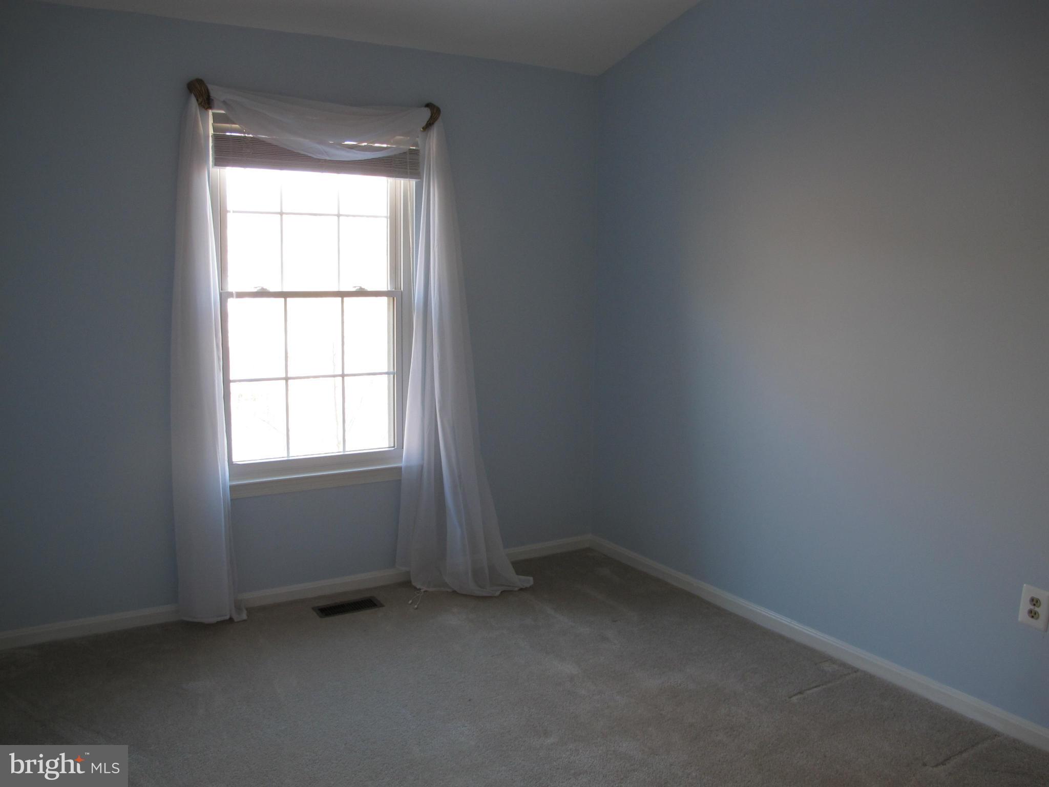 7726 Asterella Court Springfield, VA 22152 - Photo 14 of 22 an empty room with a window
